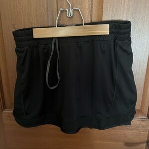 Champions women’s black skort. Good condition.